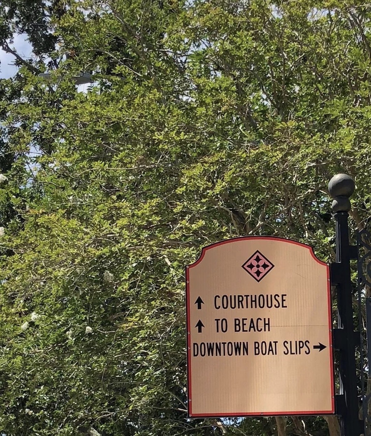 Courthouse and beach direction sign in the Tampa Bay area