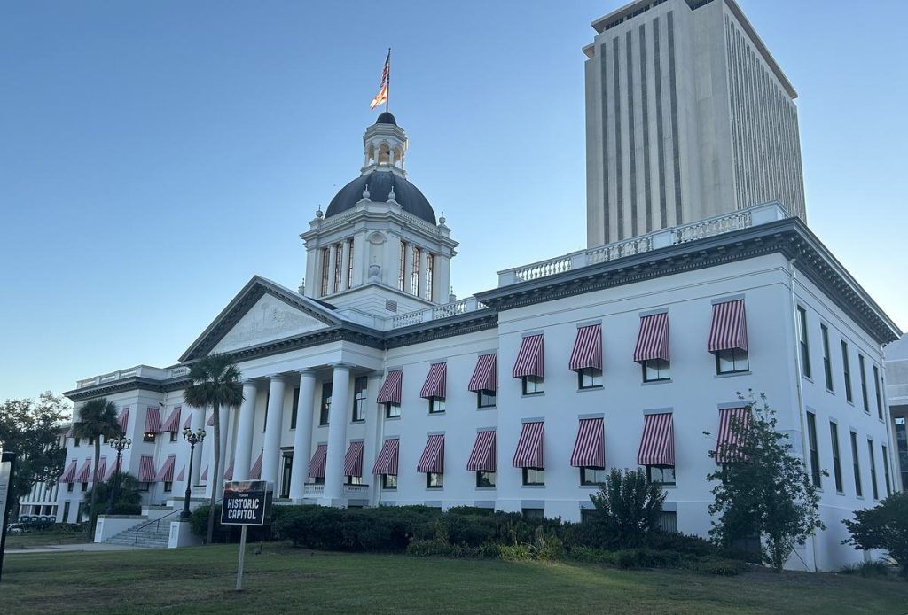 Florida's Historic Capitol in Tallahassee, with the current Capitol tower rising behind it
