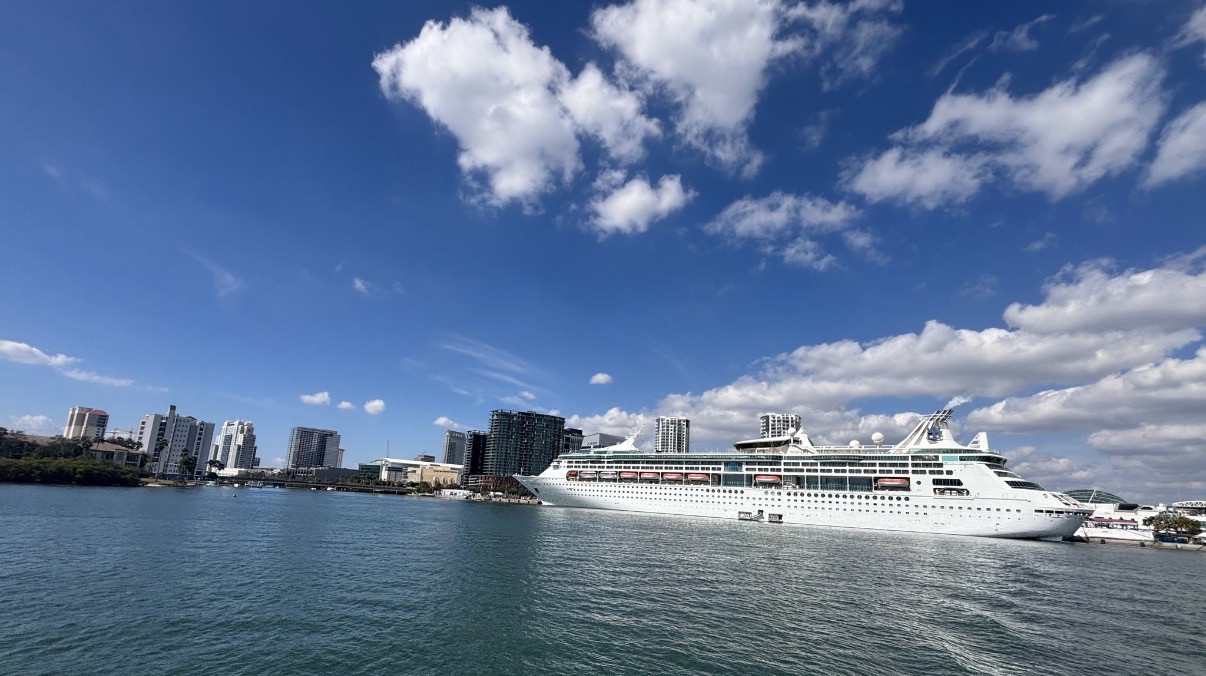 Cruise ship docked at Port Tampa Bay with the downtown Tampa skyline